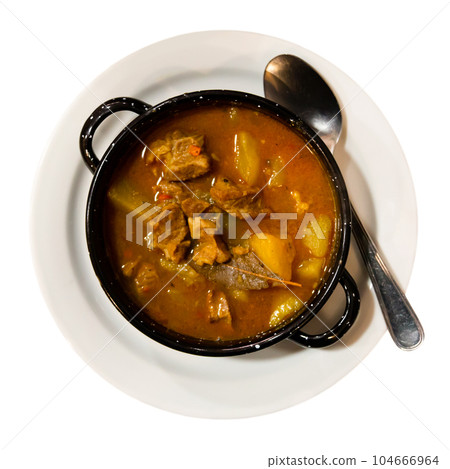 Braised beef meat with potatoes and vegetable in sauce Braised beef meat with potatoes and vegetable in sauce 104666964