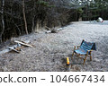Morning at the campsite in the forest, bonfire and chairs, solo camping image 104667434