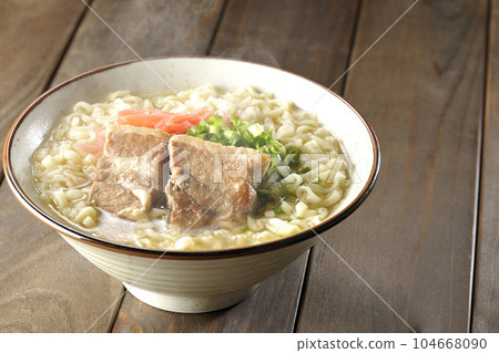 Piping hot Okinawa soba with pork belly, plenty of small green onions and pickled ginger 104668090