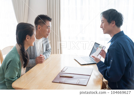 Salesman and senior couple Salesman and senior couple 104669627