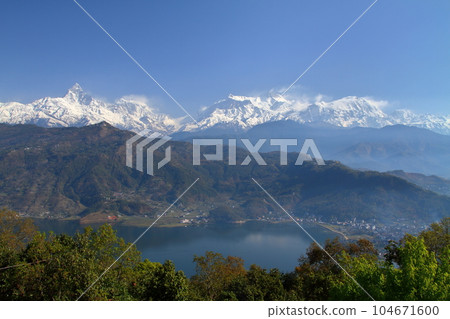 Pokhara, Nepal in South Asia Himalaya Machapuchare, Annapurna Mountain Range and Fewa Lake from Nihonsan Myohoji Temple 104671600