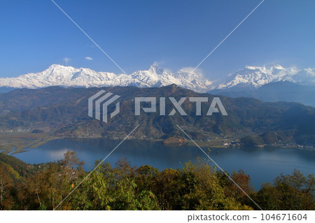 Pokhara, Nepal in South Asia Himalaya Machapuchare, Annapurna Mountain Range and Fewa Lake from Nihonsan Myohoji Temple 104671604