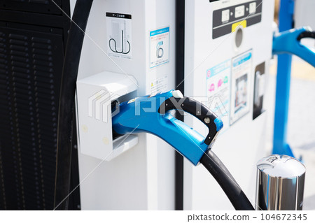 EV charging stand parking lot 104672345