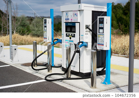 EV charging stand parking lot 104672356