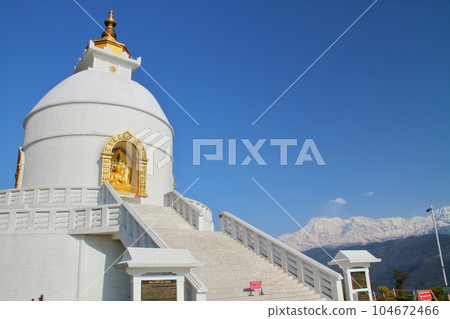 Pokhara, Nepal in South Asia Nihonsan Myohoji Stupa Stupa and Himalayan Annapurna Mountain Range 104672466