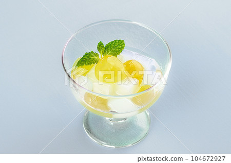 Kyoho grapes and nata de coco sweets on a blue background 104672927