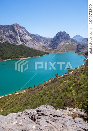 Oymapinar Lake, Turkey. Green Canyon in Manavgat region, Turkey. Emerald water reservoir behind the dam Oymapinar. A beautiful reservoir surrounded by high mountains. 104673200