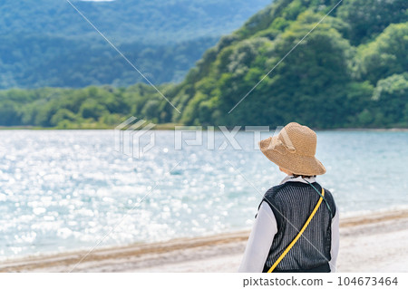 Mt. Osore, Lake Usoriyama, Gokurakuhama, a woman standing Mt. Osore, Lake Usoriyama, Gokurakuhama, a woman standing 104673464