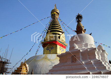 Nepal's world cultural heritage Kathmandu Valley Stupa of Tibetan Buddhist temple Swayambhunath on the hill 104674607