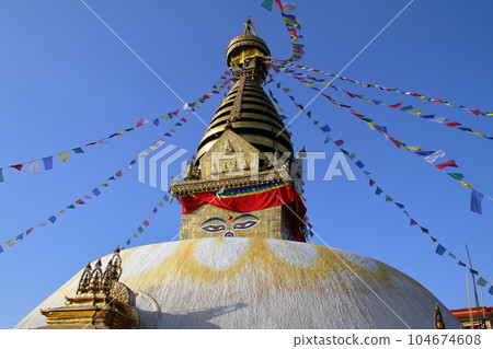 Nepal's world cultural heritage Kathmandu Valley Stupa of Tibetan Buddhist temple Swayambhunath on the hill Nepal's world cultural heritage Kathmandu Valley Stupa of Tibetan Buddhist temple Swayambhunath on the hill 104674608