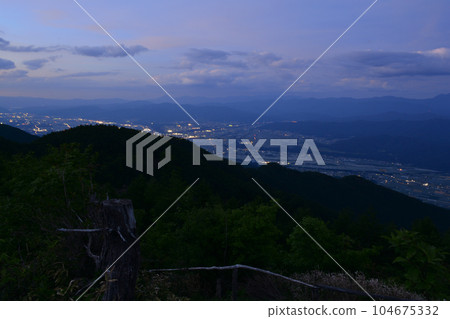 Night view of the Southern Alps and Ina Valley from Miyata Kogen Observatory 104675332