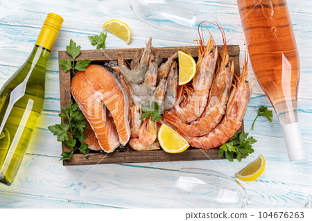 Seafood and Wine on a Table Seafood and Wine on a Table 104676263