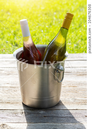 White and rose wine bottles White and rose wine bottles 104676308