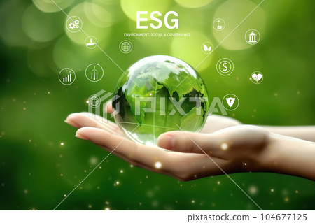 glass globe in the palm of your hand 104677125