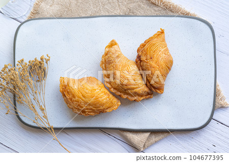 Typical pasty from Northen Portugal flat lay Typical pasty from Northen Portugal flat lay 104677395