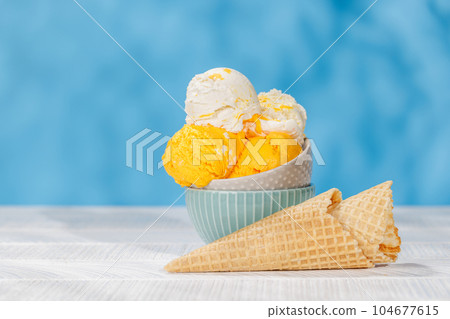 Refreshing ice cream and waffle cones with lemon flavour Refreshing ice cream and waffle cones with lemon flavour 104677615