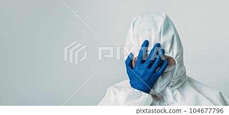 Medical fail. Frustrated scientist. Hospital stress. Doctor in white ppe coverall blue gloves with facepalm hand gesture isolated on grey background empty space. 104677796