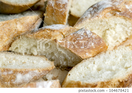 Sliced wheat bread into pieces 104678421
