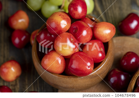 Sweet fresh cherries with other products 104678496