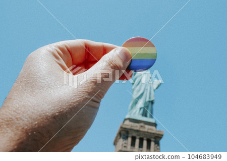 rainbow-patterned badge and the Statue of Liberty 104683949