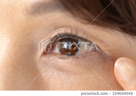 Female Senior Eye Close-up 104684048