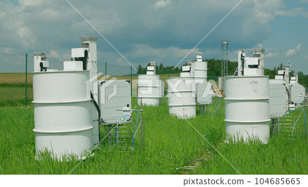 Scientific measurement respiration wheat common agriculture field Triticum aestivum soil science station scientist working technology work earth technological monitoring carbon dioxide oxide oxygen 104685665