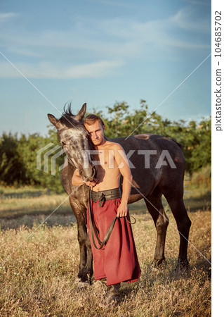Cossack and his horse. Ukraine. Zaporozhye Sech. 104685702
