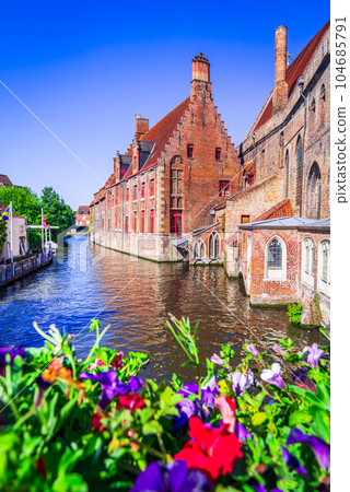 Bruges, Belgium. Dijver Canal seen from Mariabrug Bridge, Flanders. Bruges, Belgium. Dijver Canal seen from Mariabrug Bridge, Flanders. 104685791