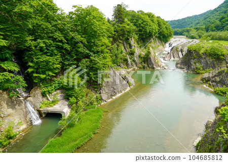 Chidorigataki Falls and Yubari River Chidorigataki Falls and Yubari River 104685812