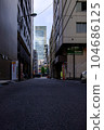 Skyscrapers seen from a back alley in Tokyo 104686125