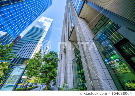Tokyo cityscape in Japan July - Otemachi Station (entrance) and office buildings. Right: Otemachi Park Building = 6th Tokyo cityscape in Japan July - Otemachi Station (entrance) and office buildings. Right: Otemachi Park Building = 6th 104688064