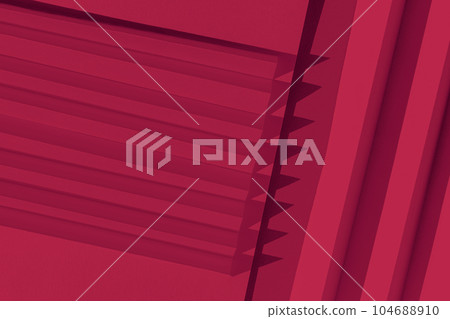 Viva Magenta color of the year 2023. Abstract crimson red color paper texture. Folded paper with harsh sun shadows, geometric shapes and lines. Viva Magenta color of the year 2023. Abstract crimson red color paper texture. Folded paper with harsh sun shadows, geometric shapes and lines. 104688910