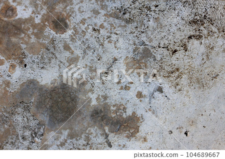 Old dark gray grungy concrete wall, background photo texture.  104689667
