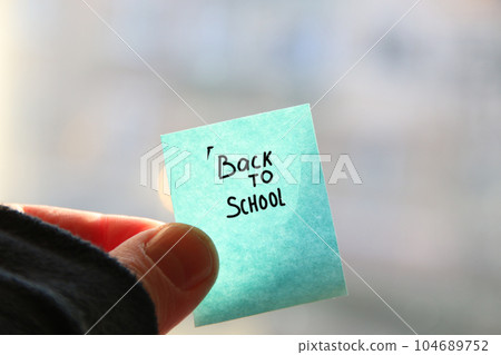 Back to School text on a paper tag. 104689752