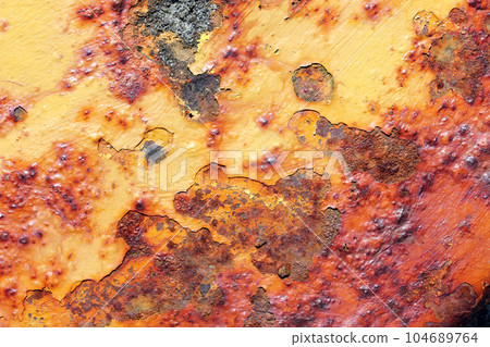 Old iron rusty mooring bollard's fragment at a harbor. Old iron rusty mooring bollard's fragment at a harbor. 104689764
