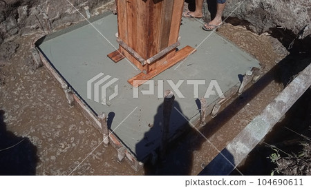 Foundation of a new house with reinforced concrete Foundation of a new house with reinforced concrete 104690611