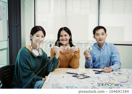 Team of Creative Web, Graphic Designer planning, drawing website ux ui app for mobile phone application and development template layout, process to developing prototype wireframe Team of Creative Web, Graphic Designer planning, drawing website ux ui app for mobile phone application and development template layout, process to developing prototype wireframe 104691384