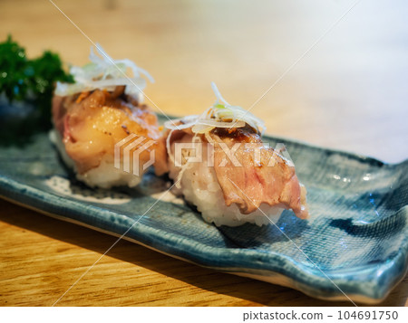 Roasted Beef sushi or Matsusaka sushi is Japanese grill slide beef with Japanese rice. Roasted Beef sushi or Matsusaka sushi is Japanese grill slide beef with Japanese rice. 104691750