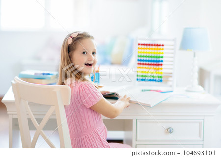 Child drawing. Kids paint. Girl after school. 104693101