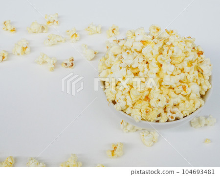 Top view of the salty flavor popcorn in the white bowl. Top view of the salty flavor popcorn in the white bowl. 104693481