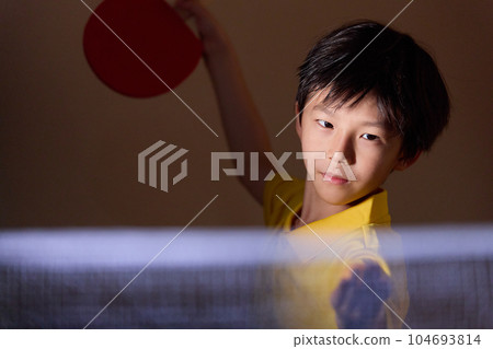 Boy playing table tennis Boy playing table tennis 104693814