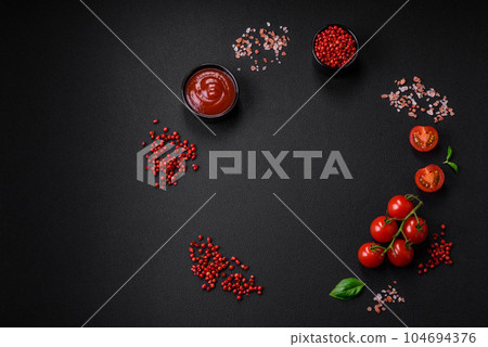 Ingredients for cooking cherry tomatoes, salt, spices and herbs 104694376