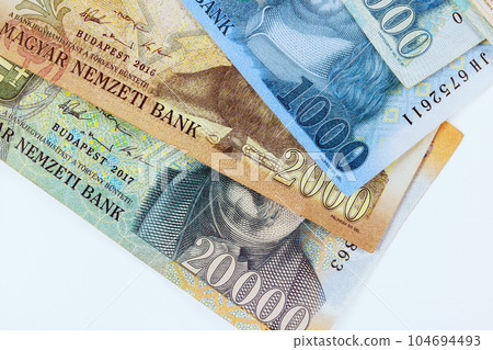 Hungarian cash forints, featuring notes of different denominations face values. Hungarian cash forints, featuring notes of different denominations face values. 104694493