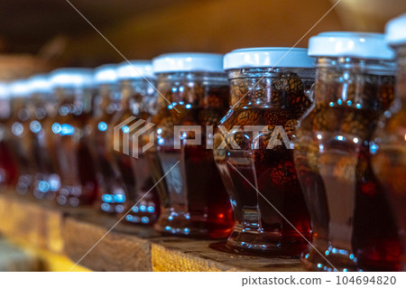 Close-up of glass jars display shelf delicious handmade eco dessert 104694820