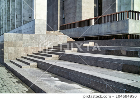 Exterior of Front Steps and a Platform at the Main Entrance to Modern Building. Exterior of Front Steps and a Platform at the Main Entrance to Modern Building. 104694950