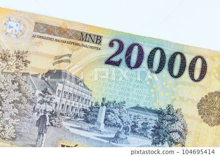 HUF cash Hungarian banknote, valued at 20,000 forint, providing clear representation of countrys currency. 104695414