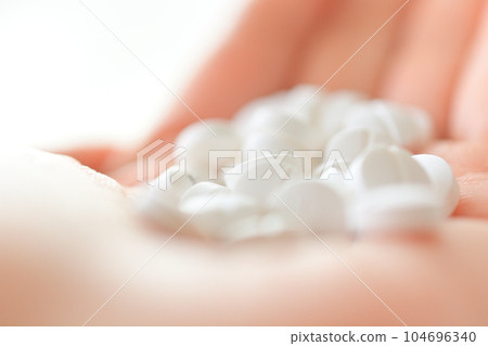 A lot of medicine on the palm A lot of medicine on the palm 104696340