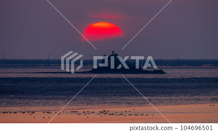 Tawarejima Island with the setting sun in the background, an island that appears in books from the Heian period such as The Pillow Book and The Tales of Ise. Tawarejima Island with the setting sun in the background, an island that appears in books from the Heian period such as The Pillow Book and The Tales of Ise. 104696501