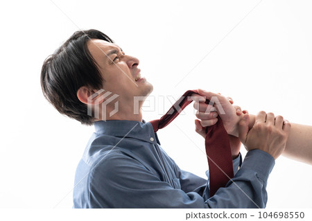 man grabbed by tie 104698550