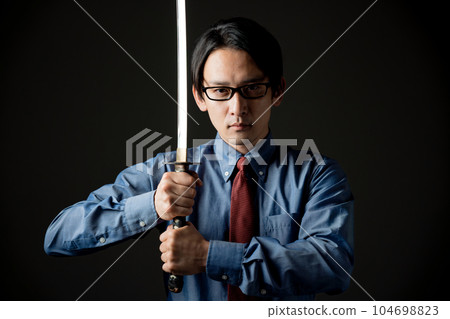 Japanese swords and businessmen Japanese swords and businessmen 104698823